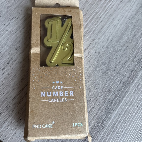 PHD CAKE Other - PHD Cake 1/2 Gold Candle In Box - Some Wear On Box